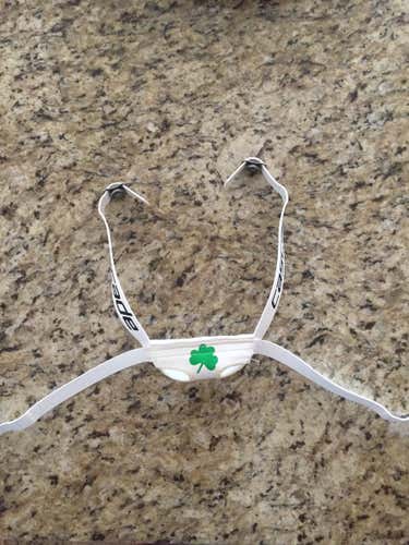 Cascade white chinstrap with green shamrock