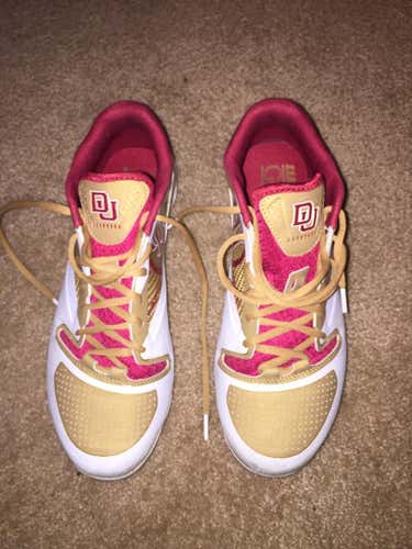 Brand new Denver Cleats 10.5