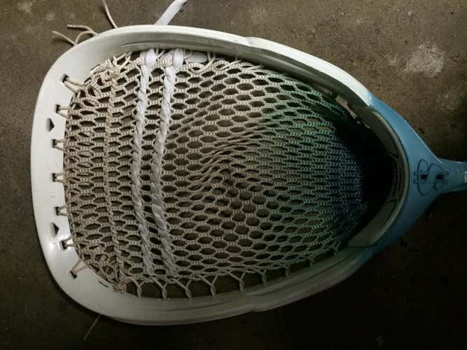 Brine money lacrosse goalie head dyed green at bottom