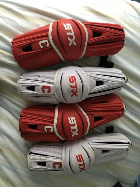 In great condition Stx stallion gloves and arm pads Cornell home and away