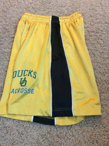 Oregon University Ducks green & yellow Lacrosse Shorts.