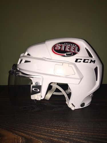 White CCM v10 helmet with Oakley straight visor