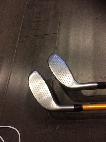 Ping I15 hybrids 20 and 23 degrees and Taylormade rosa ghost putter