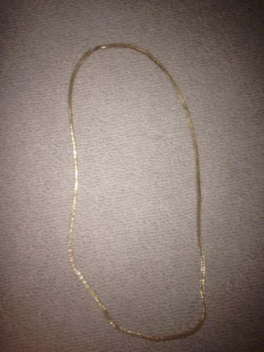 Found a possibly real gold chain on bus after football players got off