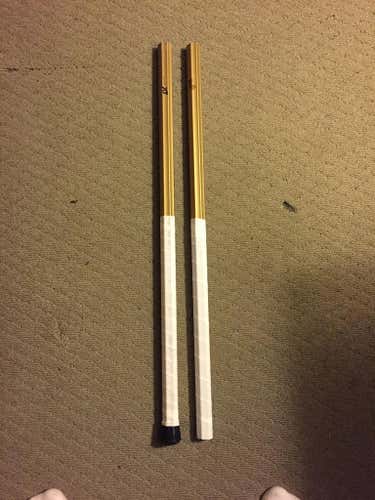 2 Gold Under Armour shafts