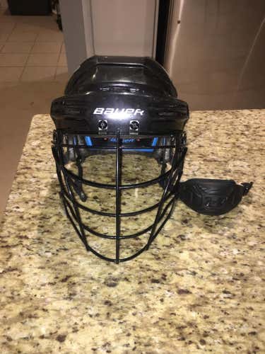 Saskatchewan Rush Bauer 7500 Helmet Adjustable all sizes with Under Armour Cage and Chin strap (G...