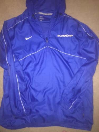 Jake Reed Nike Blue Chip Rain Pullover and champ camp bucket hat