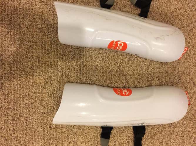 White POC Shin Guards and Swix Handguards and Pole Guards with hardware