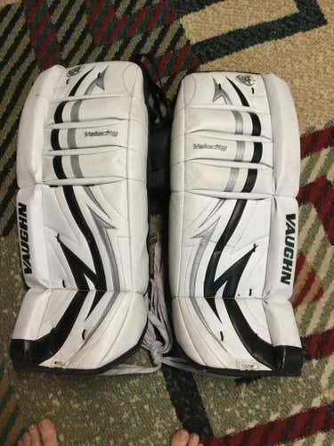 Vaughn Velocity hockey goalie leg guards. 24"+1". Black and white