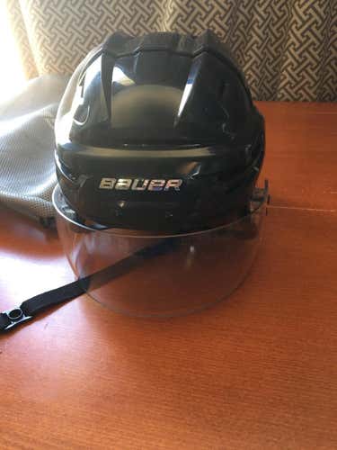 Men's large Bauer react black hockey helmet with visor and helmet bag