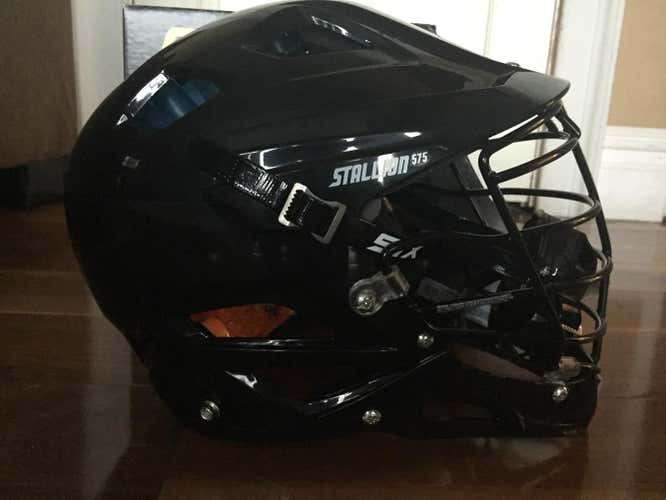 STX stallion 575 lacrosse helmet black new in packaging large probably fits about age 12-15