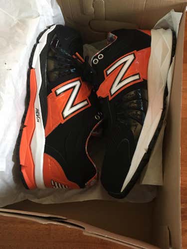 New balance turf shoes size 9 black orange new