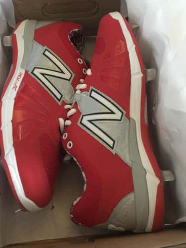 New balance new cleats red size 10 metal