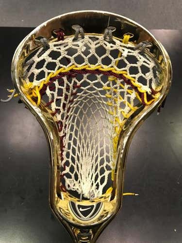 Gold chrome Nike head, vortex custom string job