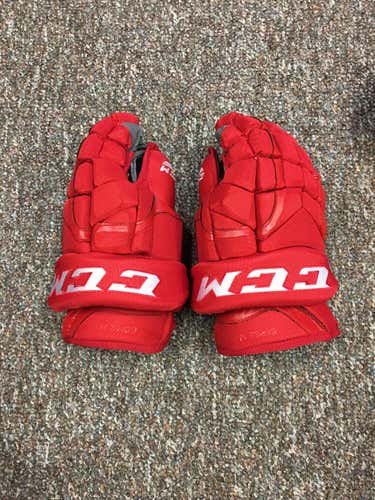 CCM Pro Stock Gloves excellent conditions 13inch  color Red  $70.00