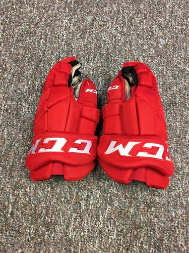 CCM Tacks glove Pro Stock sz 14inch.  Color Red. great condition.  70.00