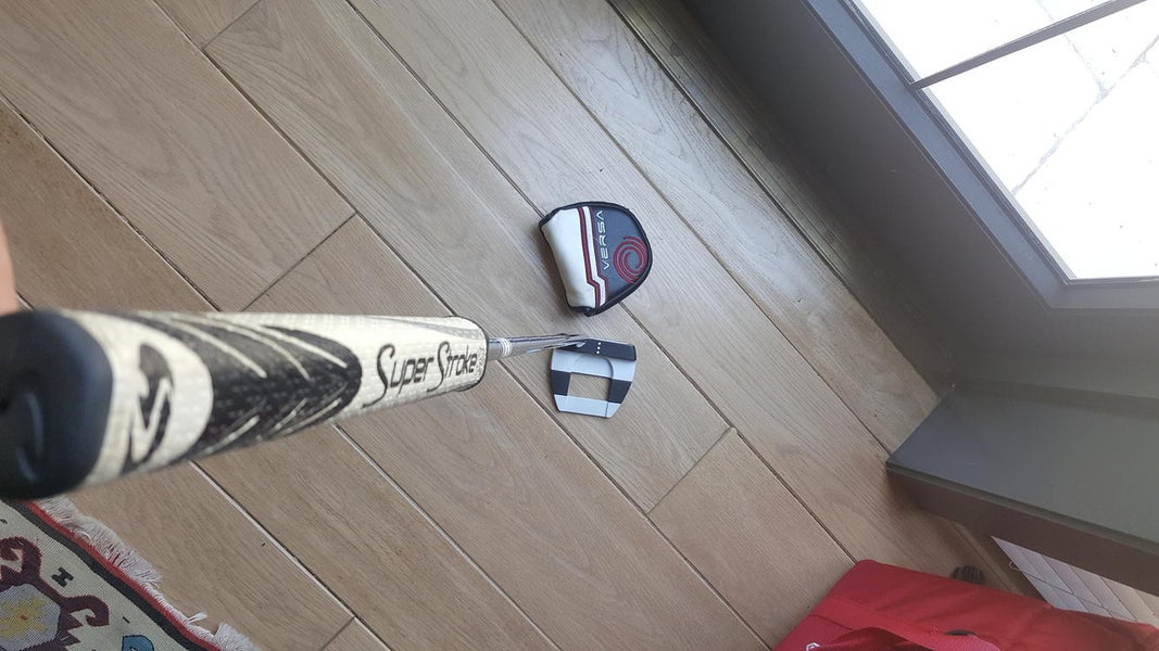 Odyssey versa jailbird putter with super stroke grip and putter cover
