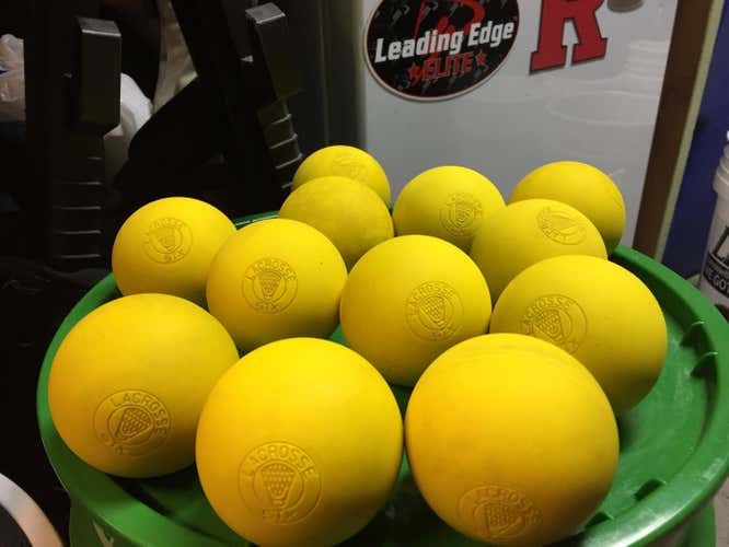 12 STX yellow lacrosse balls