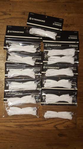 13 packs of String King white sidewall strings