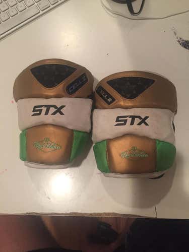 High Rollers all star team arm pads gold white and green