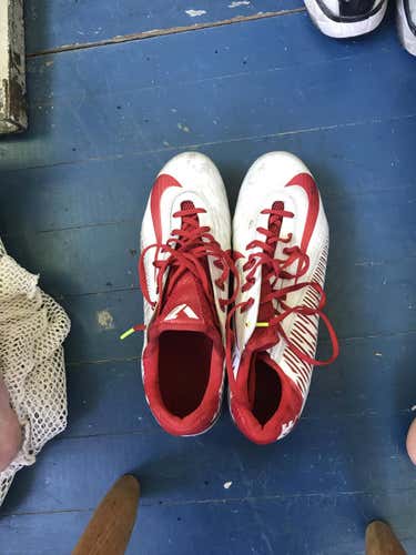 Red and white cleats 11