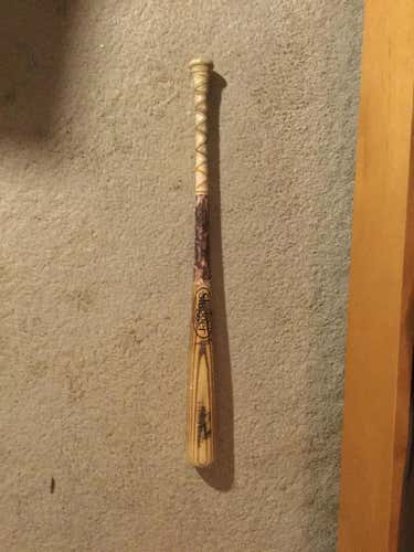 Minor league issued and used baseball bat