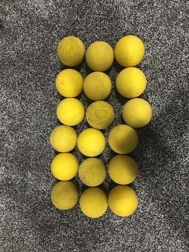 18 used yellow lacrosse balls