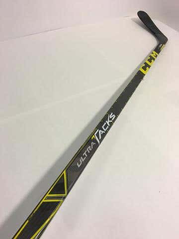 870 - USED LEFT HANDED CCM ULTRA TACKS - 100 FLEX - P90 CURVE - GRIP - 57" TALL STANDING UP AGAIN...