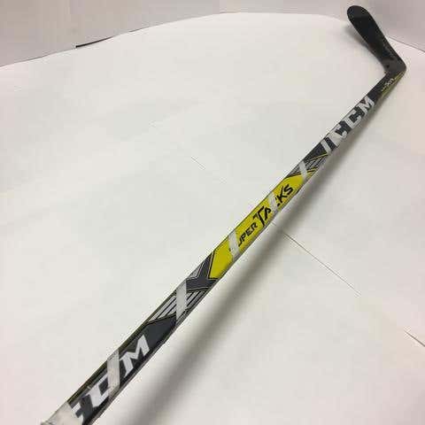 881 - USED LEFT HANDED CCM SUPERTACKS - GRIP - P90 CURVE - 85 FLEX - 65"