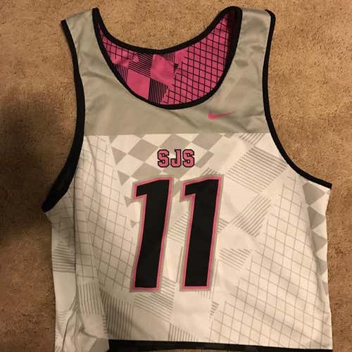 cleats and pinnie