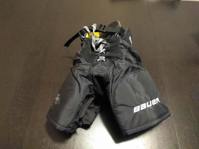 Yellow interior, black exterior, youth pants