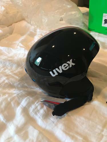 New. Uvex soft ear helmet. With chin bar.