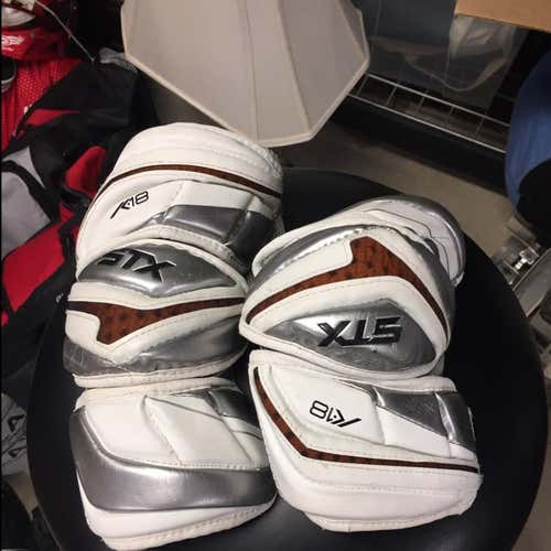 Lightly Used White STX K18 Lacrosse Midsize Arm Pad
