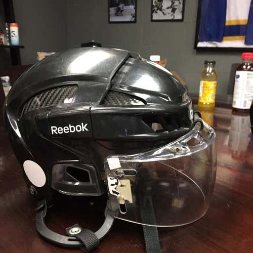 Black Reebok 11k Helmet With The Oakley Visor Included