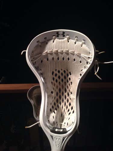 Twice used underarmour comand head string with channel mesh.