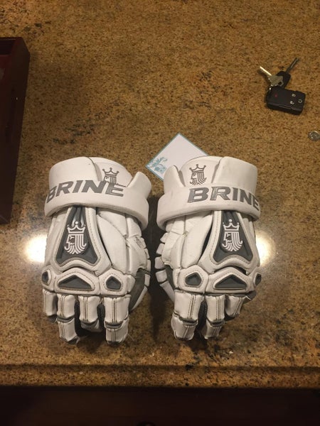 brine king v gloves. worn one season, no rips tares or cuts. good condition overall.