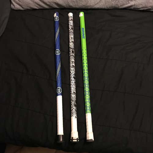 Three Lacrosse Shafts