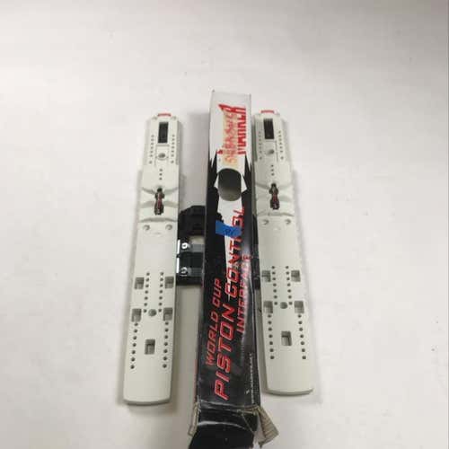 Marker piston race plate