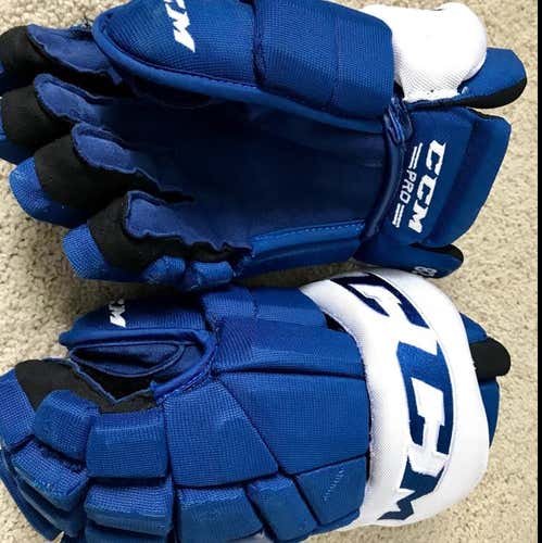 NHL PRO STOCK 14” CCM HGTKPP TACKS MAPLE LEAFS HOCKEY GLOVES