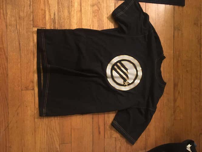 Maverik black and gold t shirt