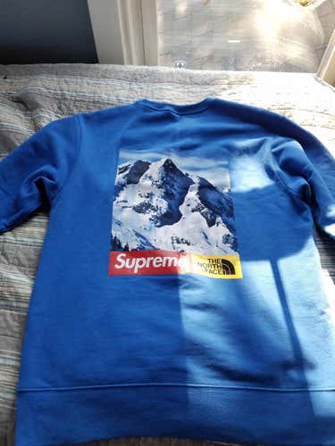 Supreme x north face mountain crewneck sweatshirt.