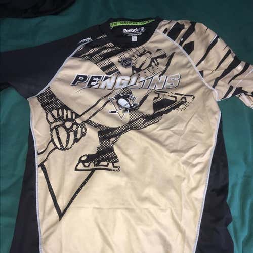 Pittsburgh Penguins Reebok 2016 Center Ice LAYDRY Gold and Black Compression Shirt Medium