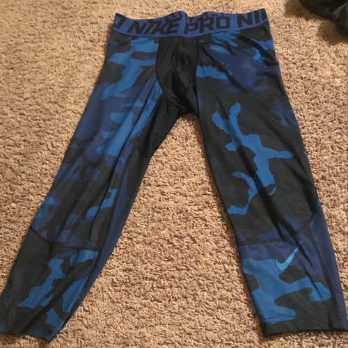 Nike 3/4 Blue camo leggings.