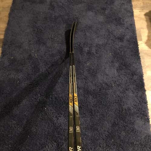 Two Bauer MXG Two piece Sticks