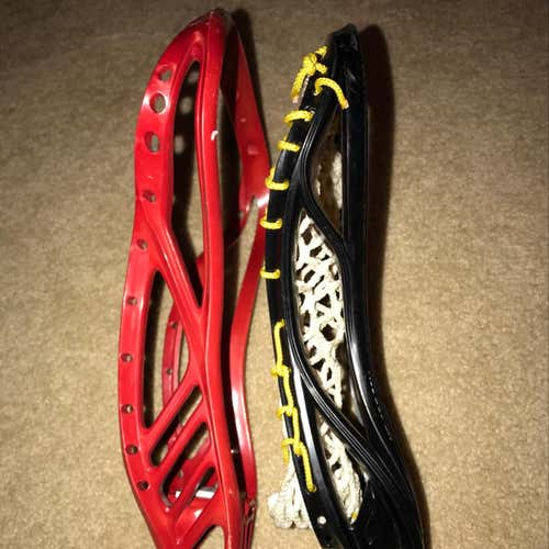 An STX Black Revolver And A Warrior Red Cobra