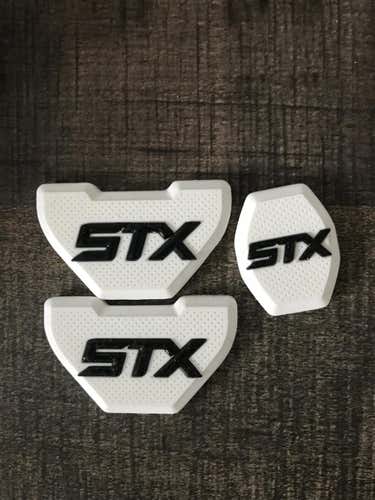 Variety of used lacrosse butt ends/ball stops