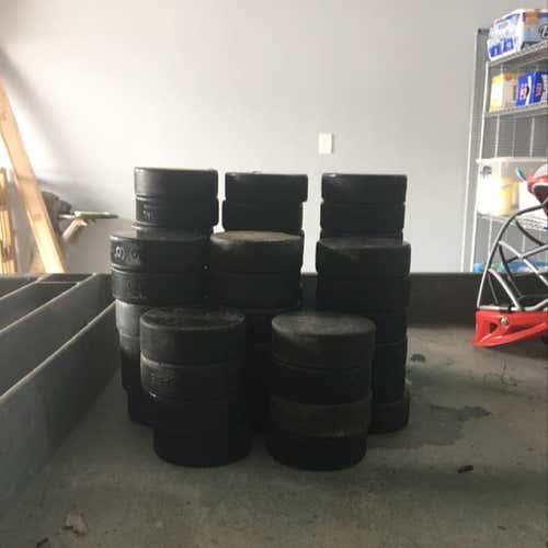 50 Hockey Pucks 1 Dollar For One