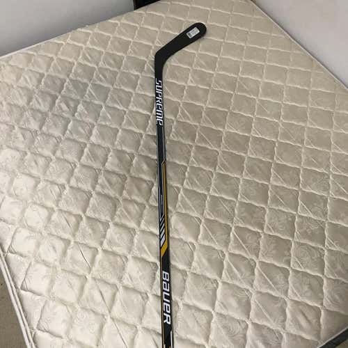 Bauer College Stick.