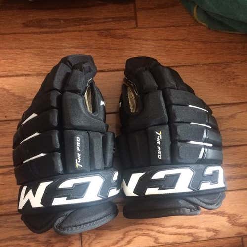 Used CCM Tacks 4 Roll Pro Gloves 13 Black