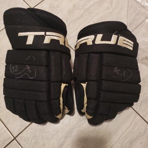 Ducks Chris Stewart signed and game used True Pro 4 rolls gloves, size 13", LOA